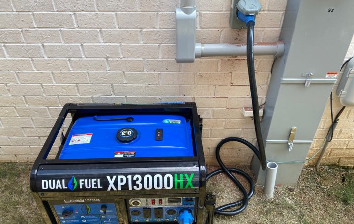 Blue generator installed outside a residential home in Hernando, MS